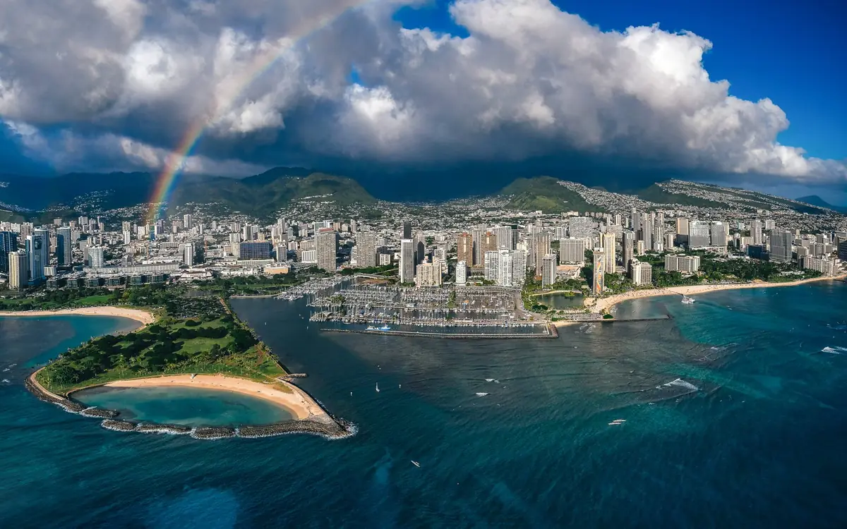 Honolulu and Waikiki with a rainbow, seen from a helicopter