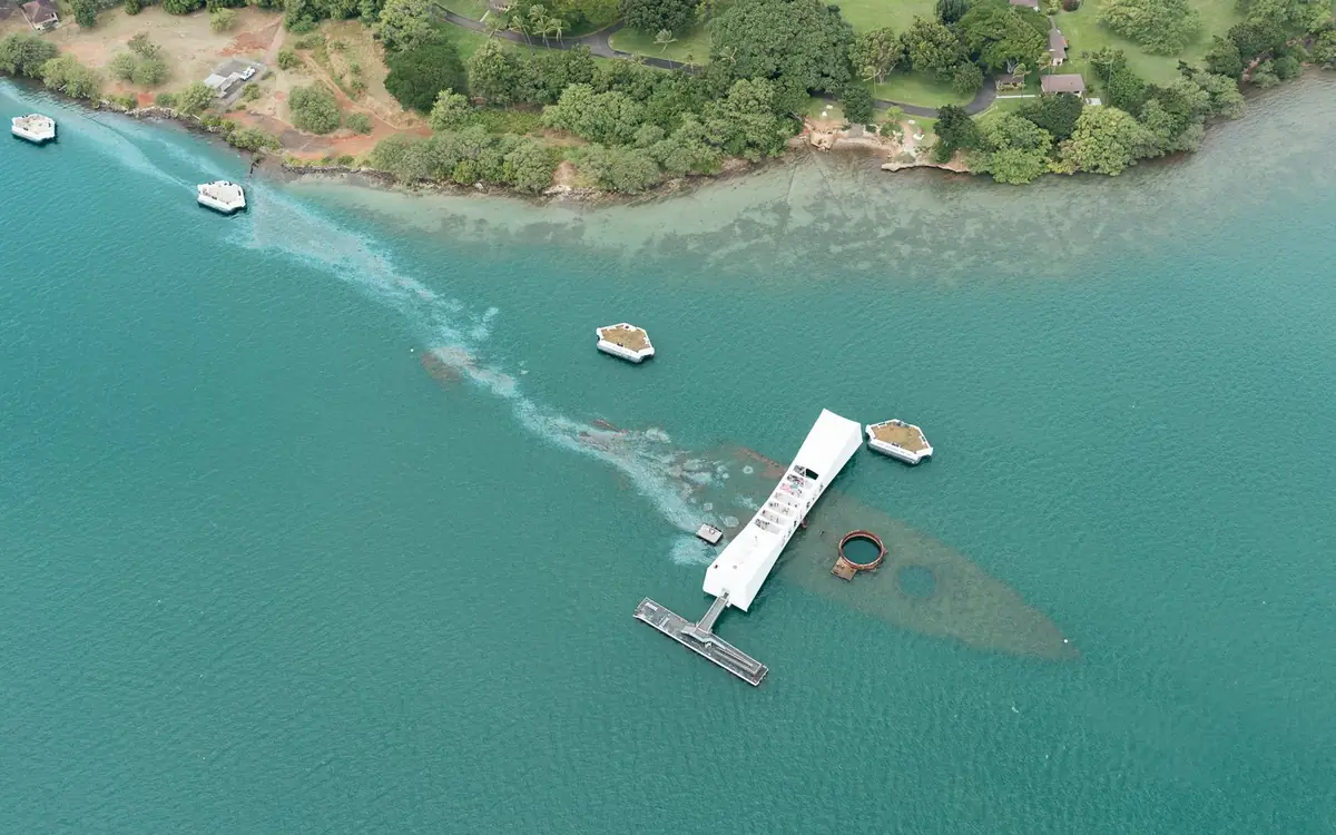 Pearl Harbor with the USS Arizona Memorial seen from a helicopter